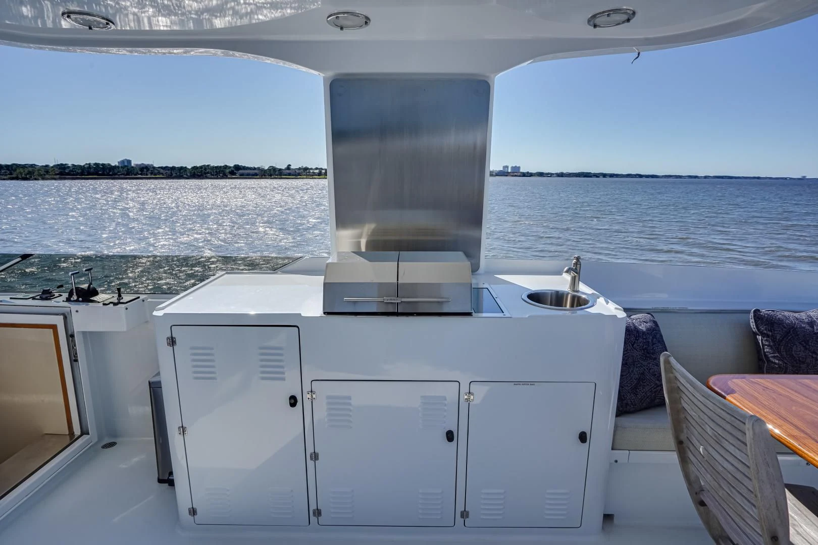 a boat with a sink and a stove on it aboard CHECKERS Yacht for Sale