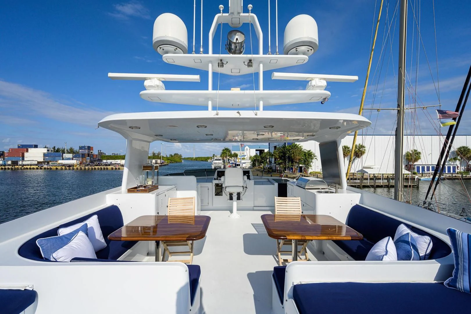 a plane flying over a boat aboard CHECKERS Yacht for Sale