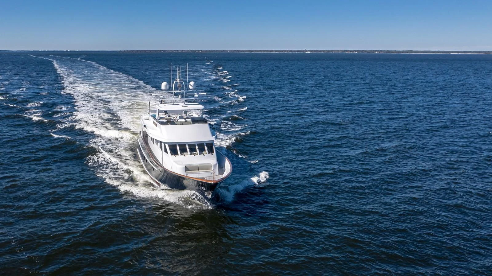 a boat on the water aboard CHECKERS Yacht for Sale