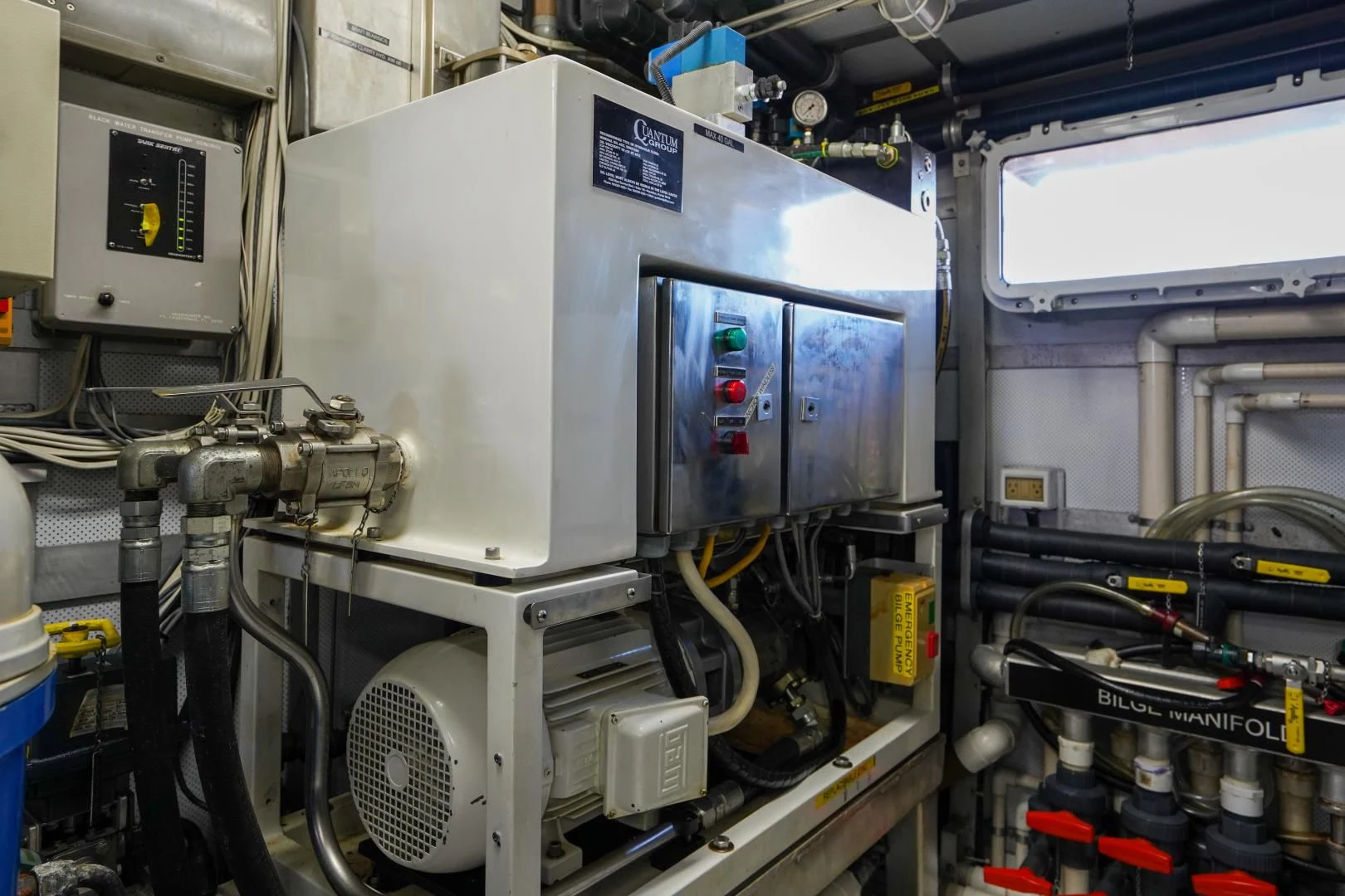 a machine with a large piece of equipment in it aboard CHECKERS Yacht for Sale