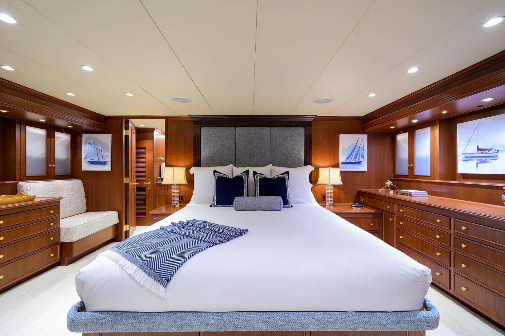 a large bed in a hotel room aboard CHECKERS Yacht for Sale