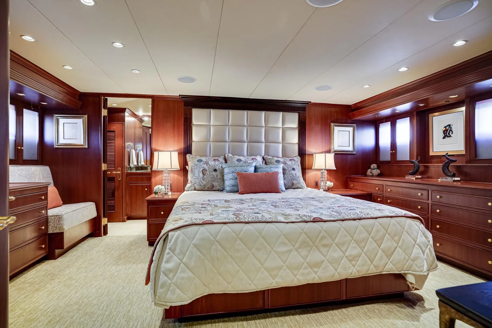 a large bedroom with a large bed aboard CHECKERS Yacht for Sale