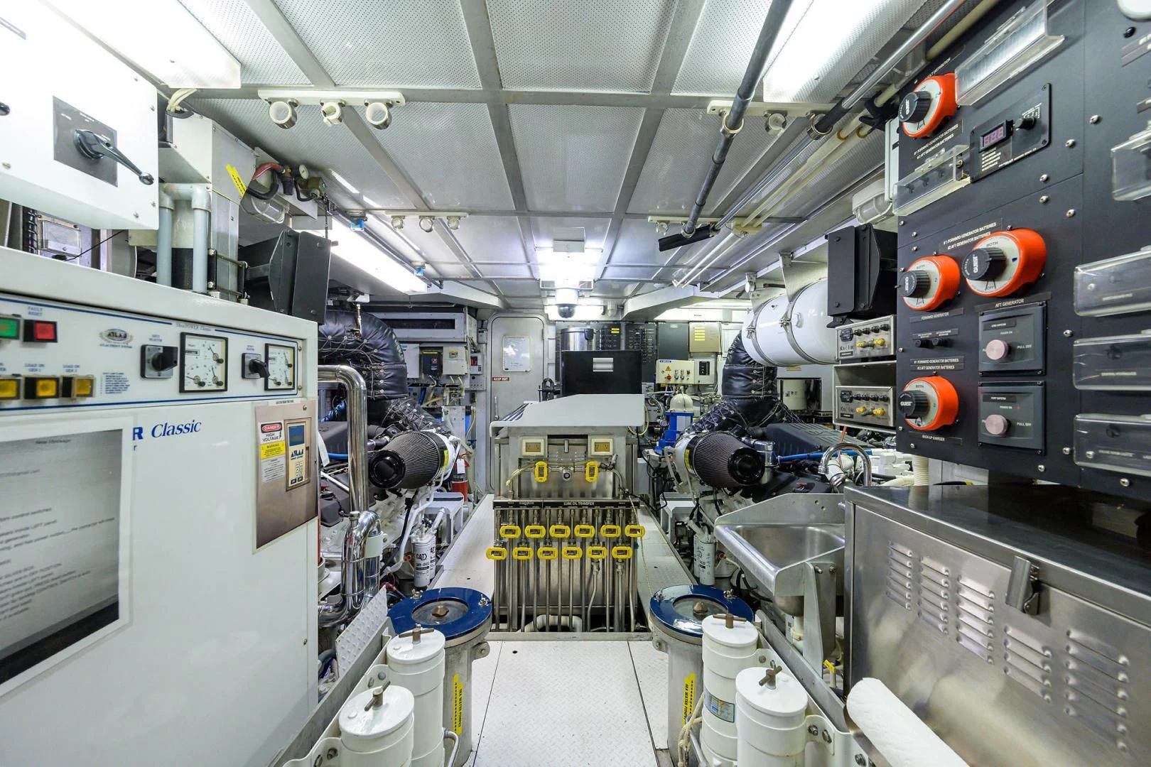 a room with several machines aboard CHECKERS Yacht for Sale