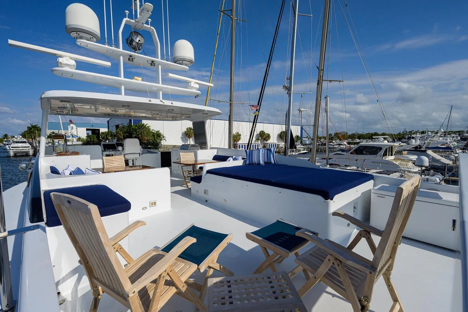 a boat docked at a pier aboard CHECKERS Yacht for Sale