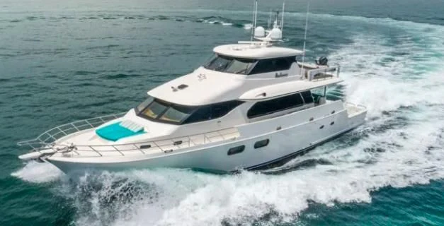 a white yacht on the water aboard ANDIAMO Yacht for Charter