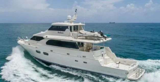 a white yacht in the ocean aboard ANDIAMO Yacht for Charter