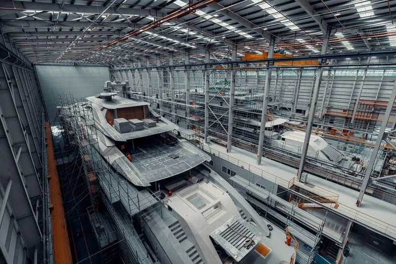 a large warehouse with several racks aboard AL REEM Yacht for Sale
