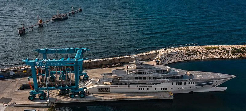 a large white ship docked at a port aboard AL REEM Yacht for Sale