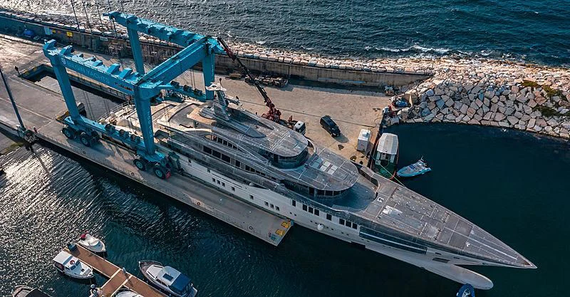 a large ship docked at a port aboard AL REEM Yacht for Sale