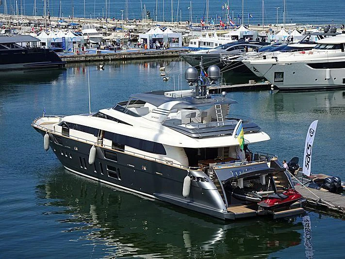 a boat docked at a pier aboard M&A'S Yacht for Sale
