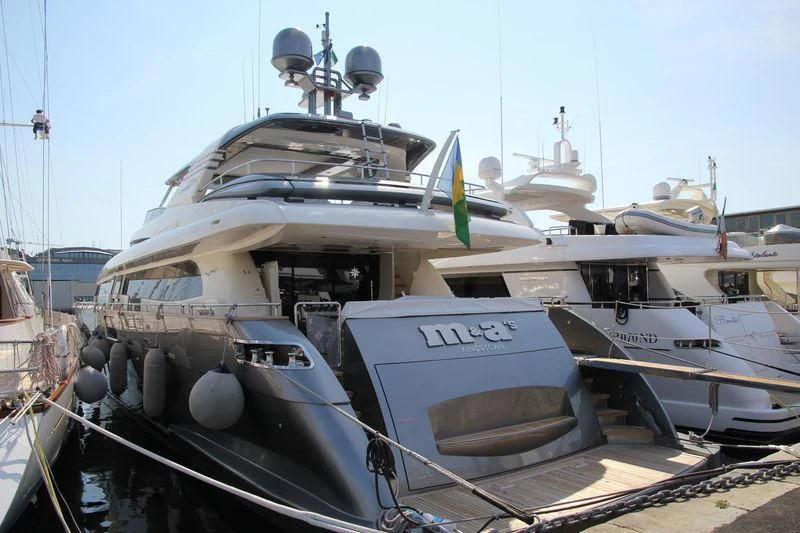 a couple of boats are parked aboard M&A'S Yacht for Sale