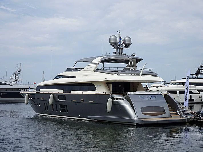 a large white yacht in the water aboard M&A'S Yacht for Sale