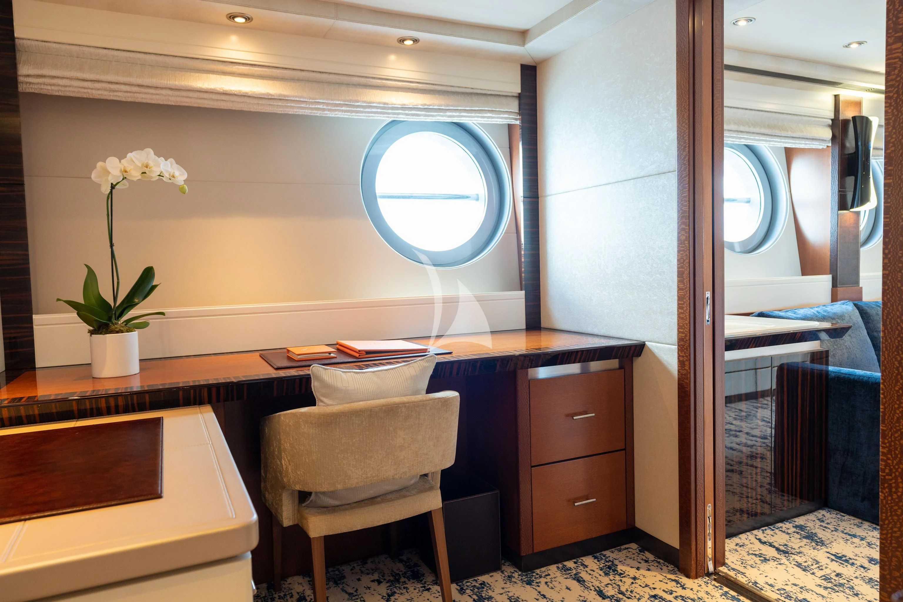 a room with a desk and a window aboard AQUANOVA Yacht for Sale