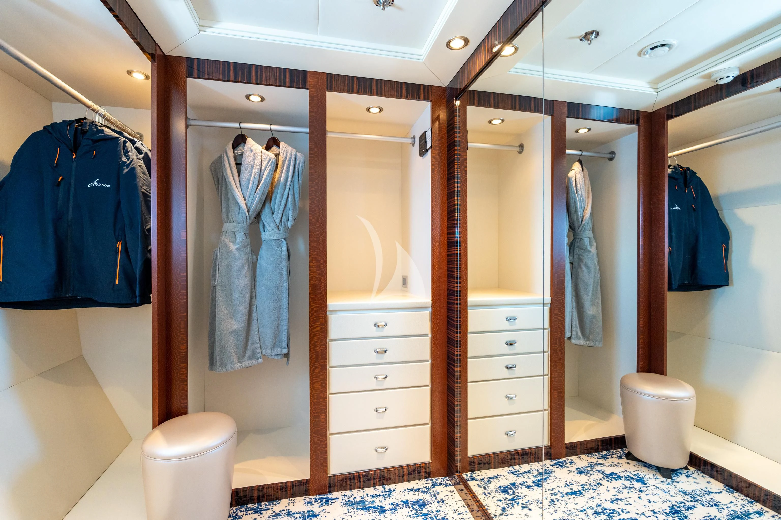 a bathroom with a standup shower aboard AQUANOVA Yacht for Sale