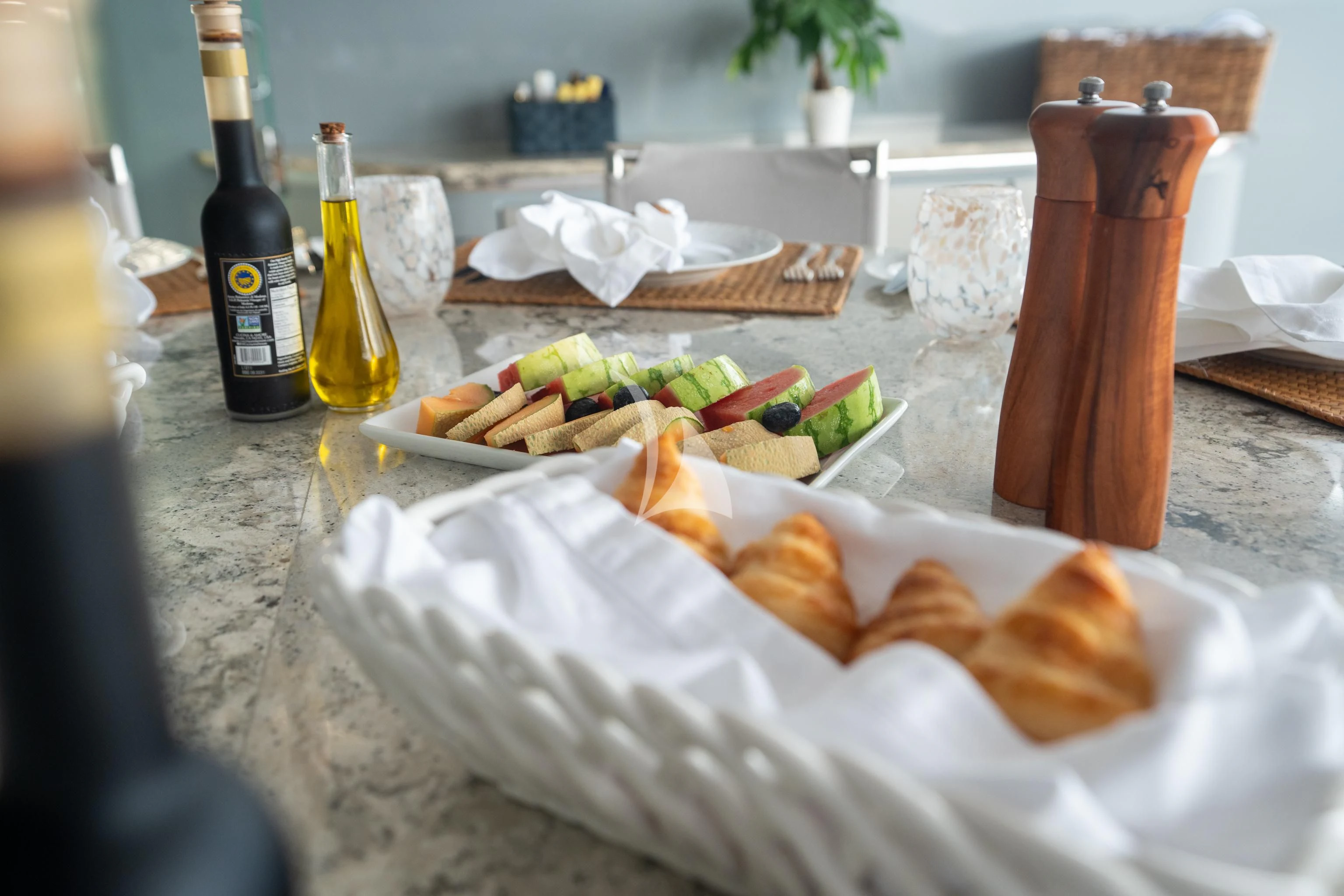 a table with food and drinks aboard AQUANOVA Yacht for Sale