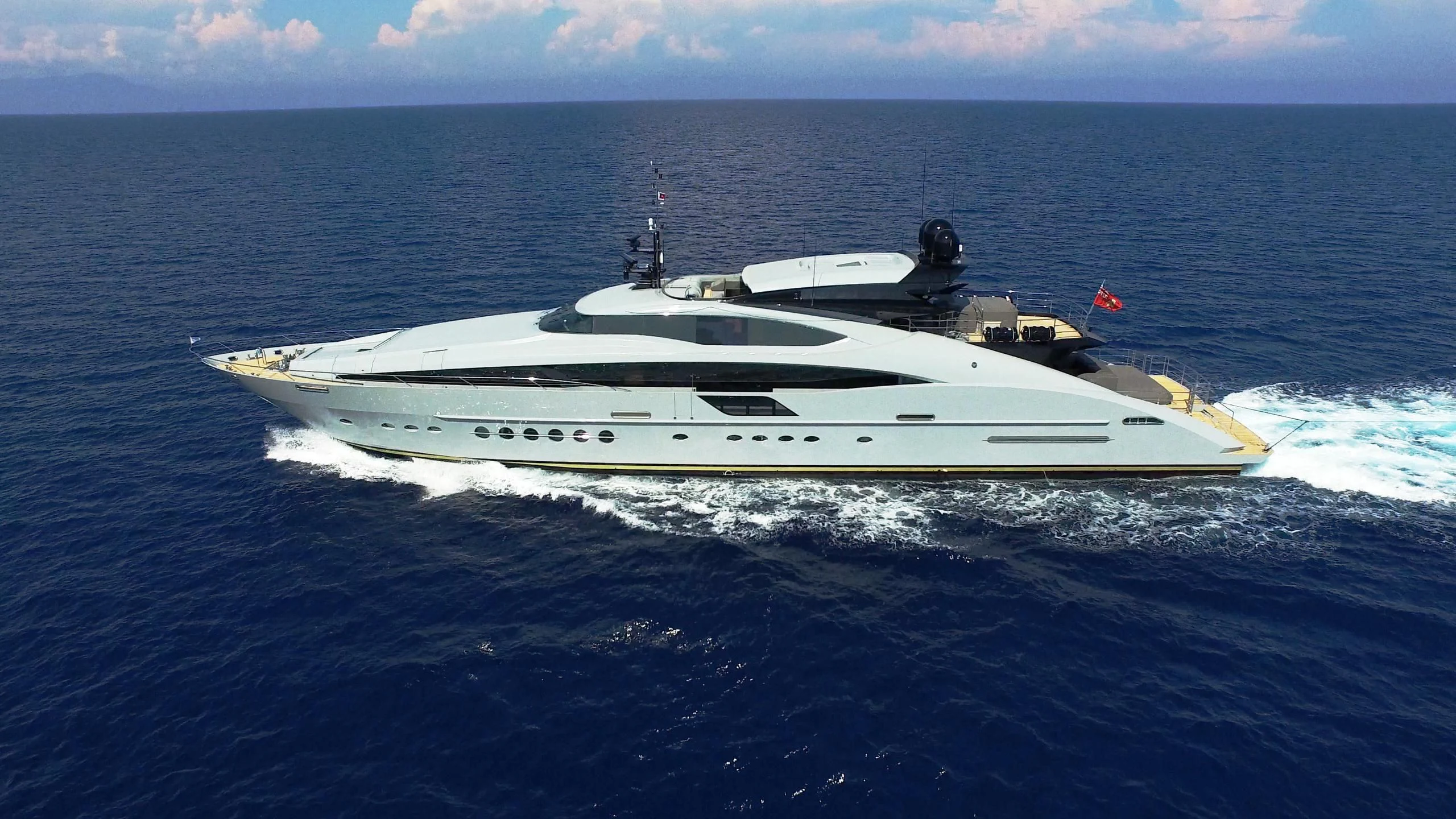 a white yacht in the ocean aboard AQUANOVA Yacht for Sale