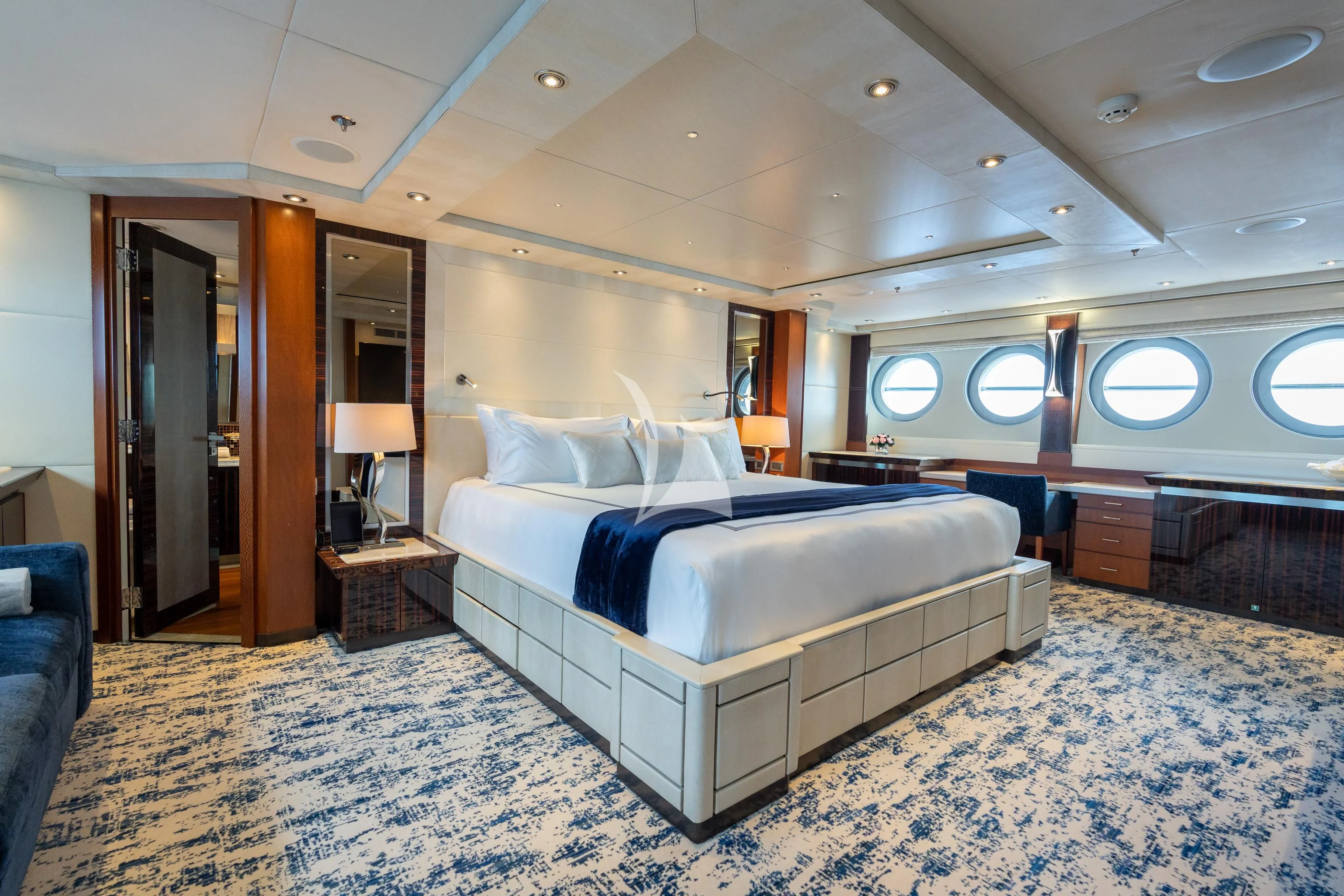 a large bedroom with a bed aboard AQUANOVA Yacht for Sale