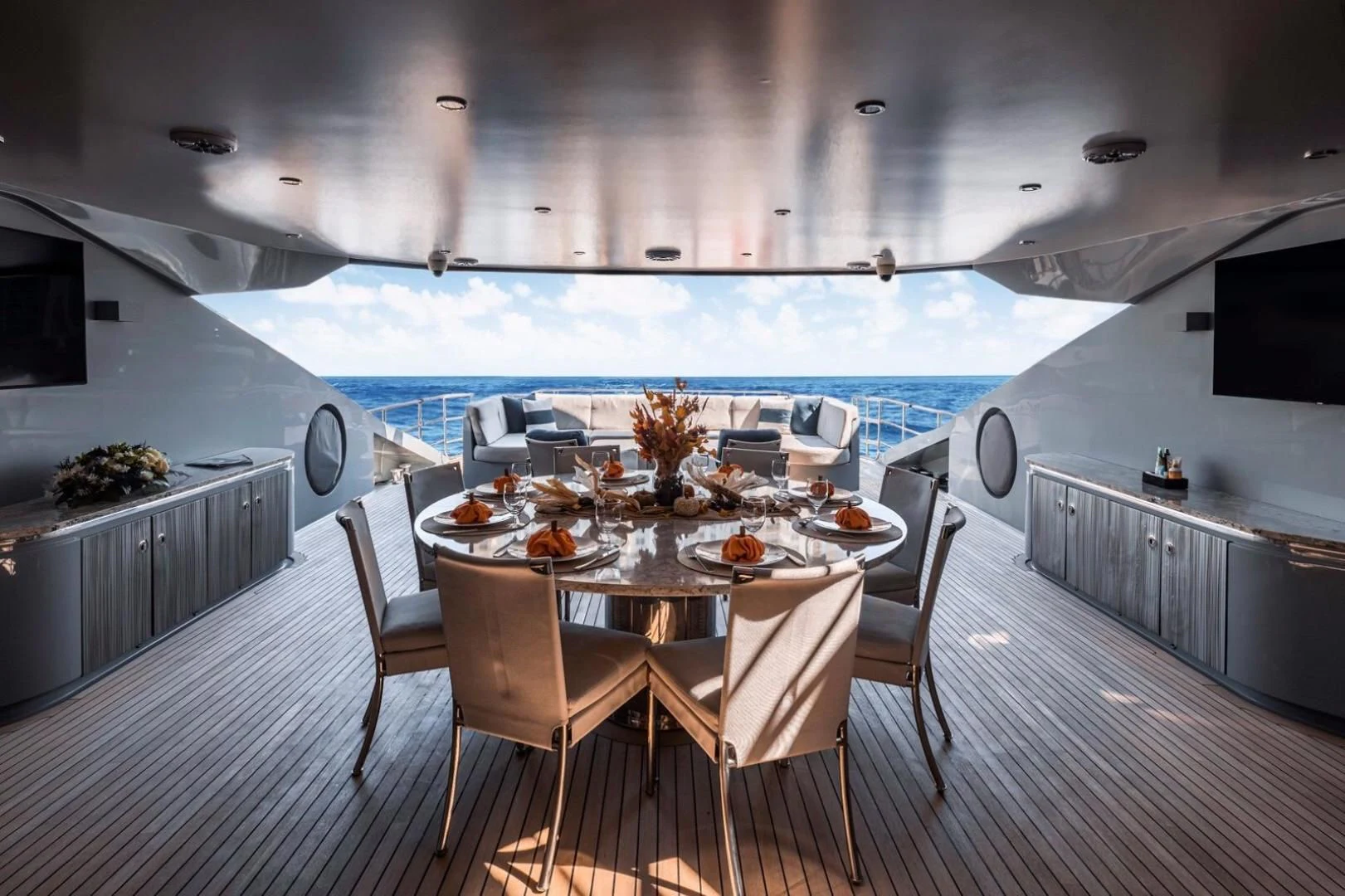 a dining table in a kitchen aboard AQUANOVA Yacht for Sale