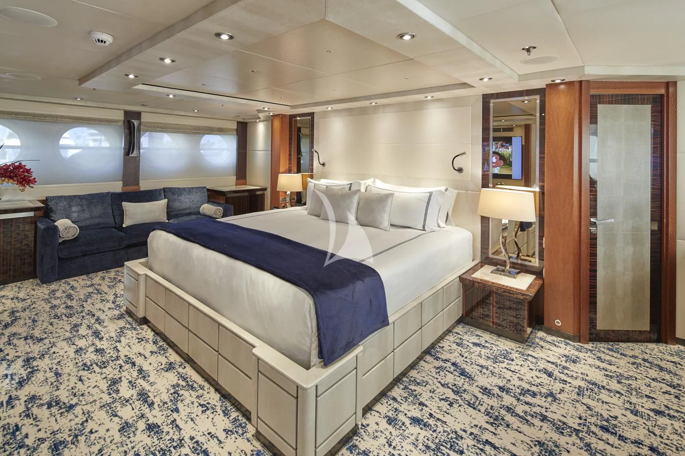 a large bedroom with a bed aboard AQUANOVA Yacht for Sale