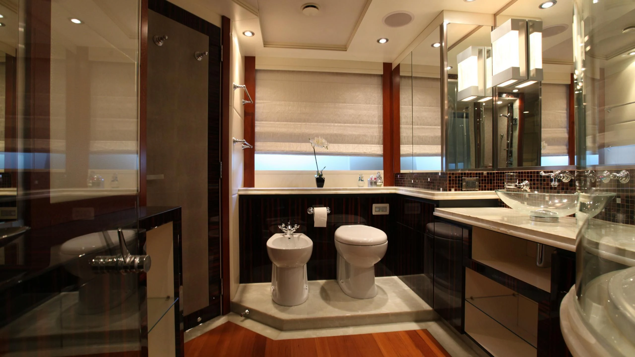 a bathroom with a glass display aboard AQUANOVA Yacht for Sale