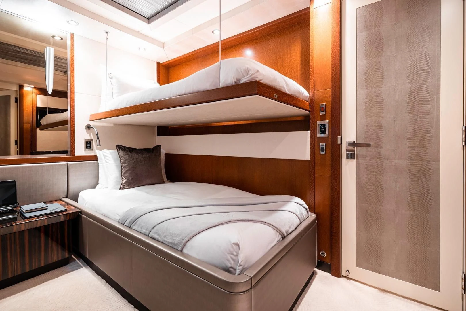 a bed in a room aboard AQUANOVA Yacht for Sale
