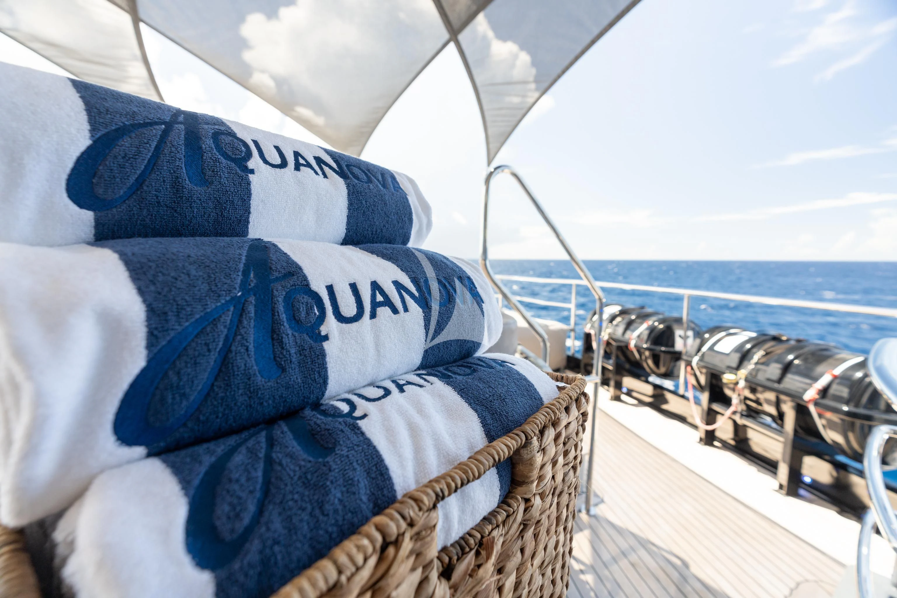 a boat with a flag on it aboard AQUANOVA Yacht for Sale