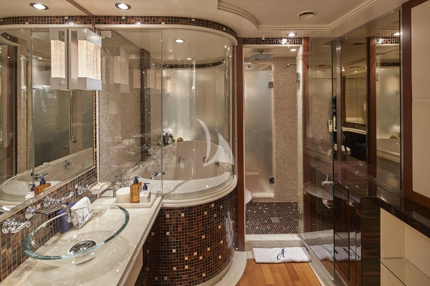 a bathroom with a large glass shower aboard AQUANOVA Yacht for Sale