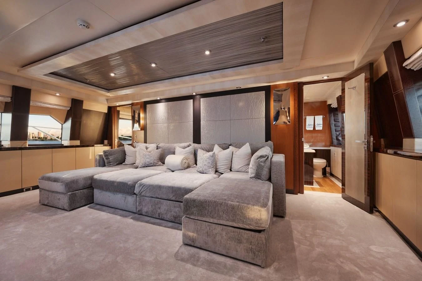 a living room with a couch aboard AQUANOVA Yacht for Sale