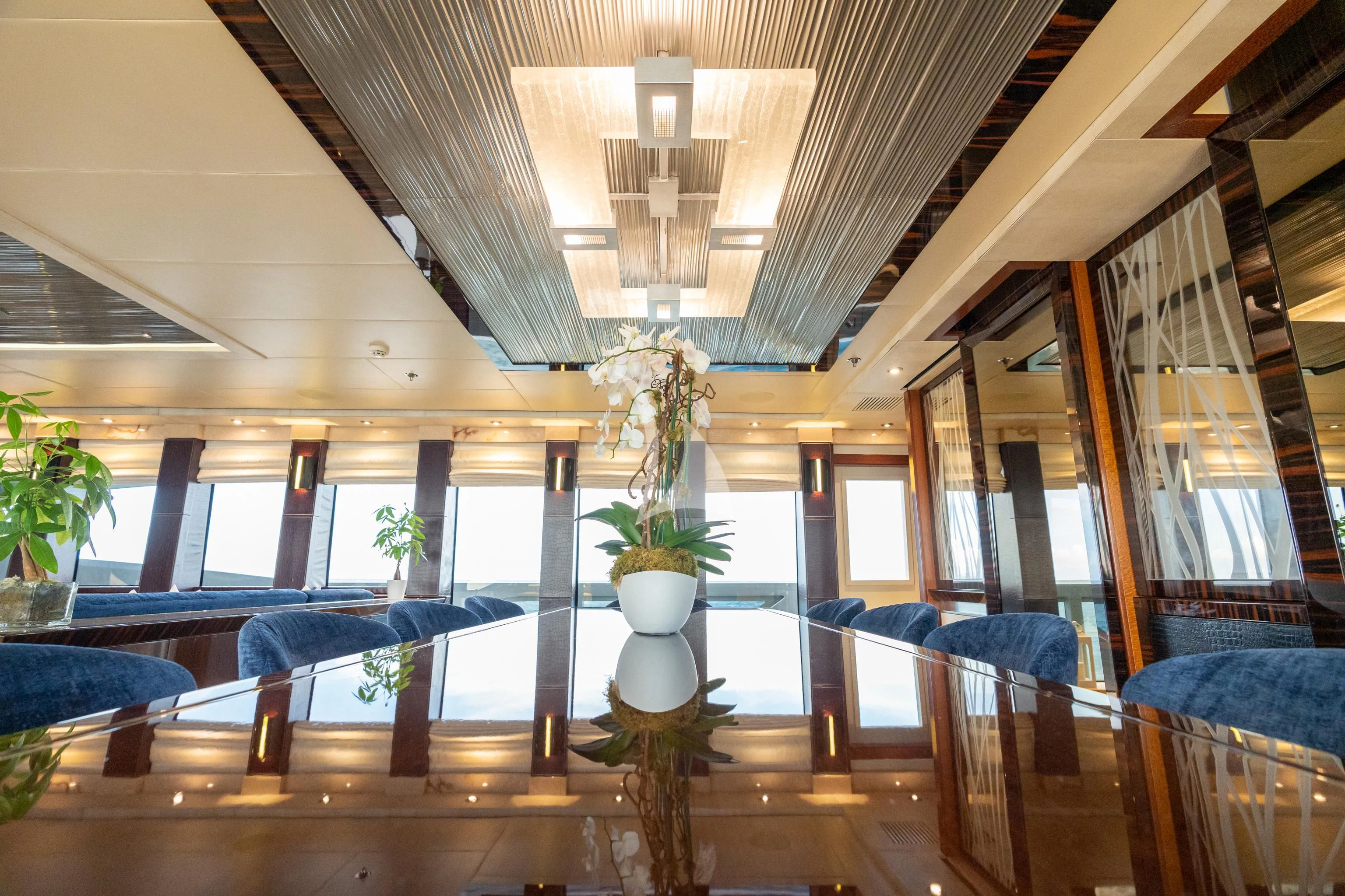 a room with a plant in it aboard AQUANOVA Yacht for Sale