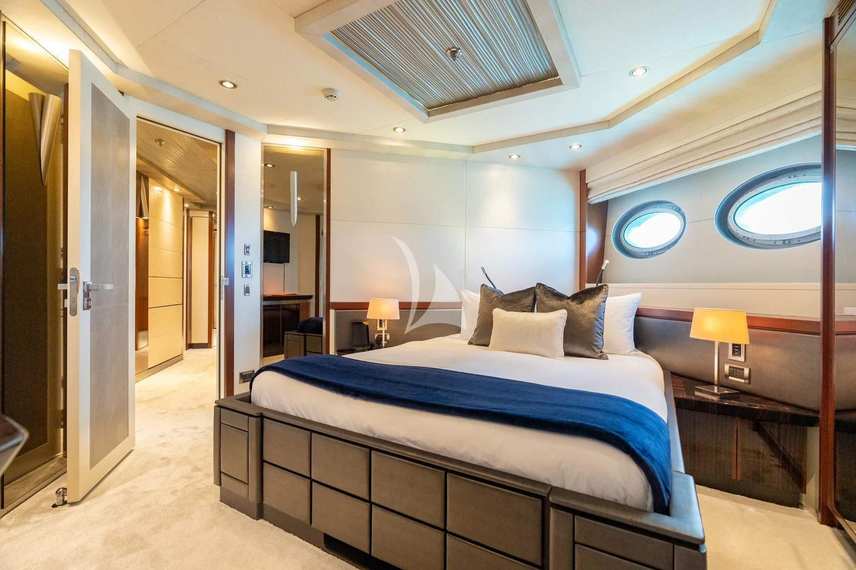 a bed in a room aboard AQUANOVA Yacht for Sale