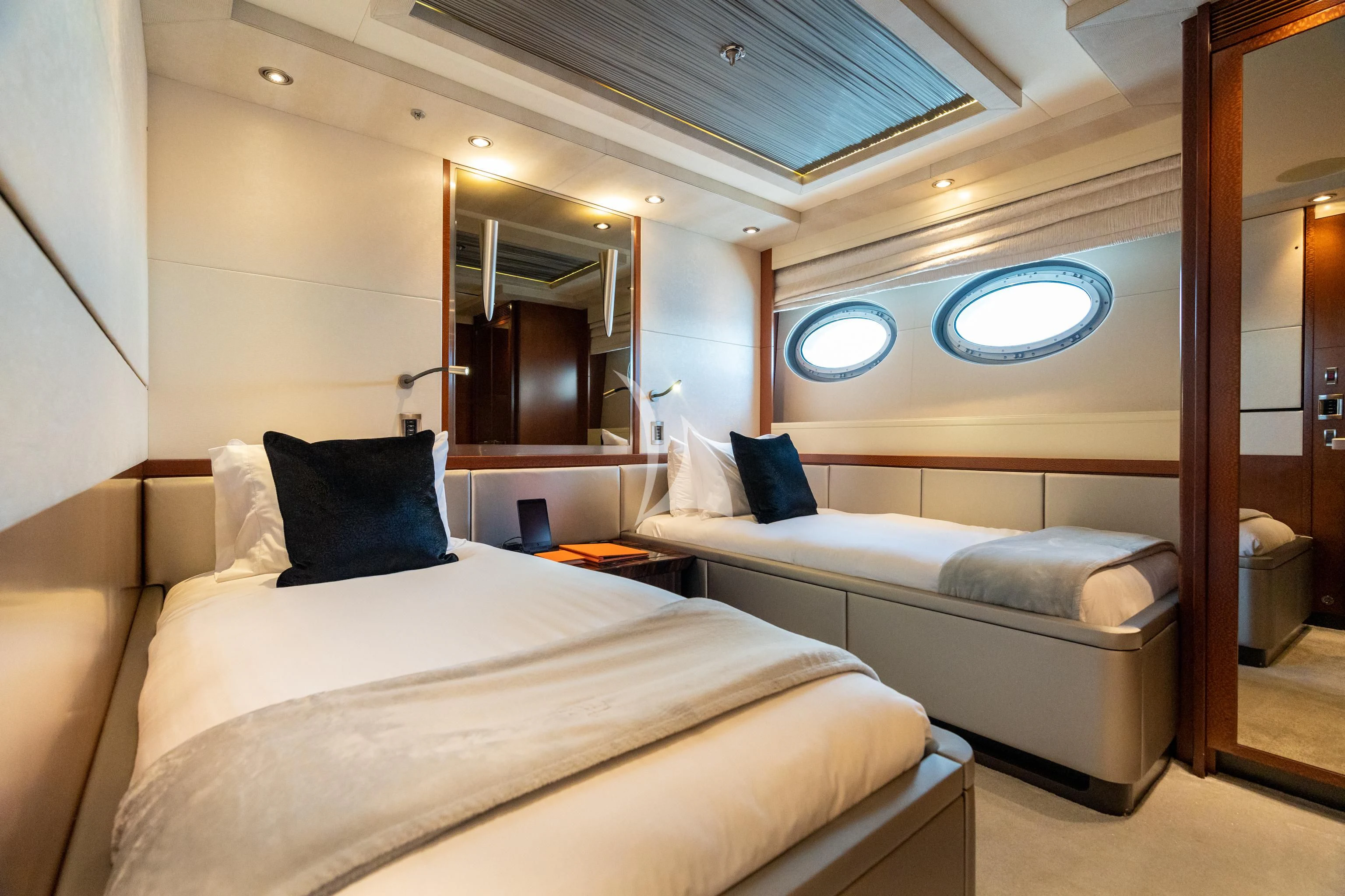 a room with two beds aboard AQUANOVA Yacht for Sale