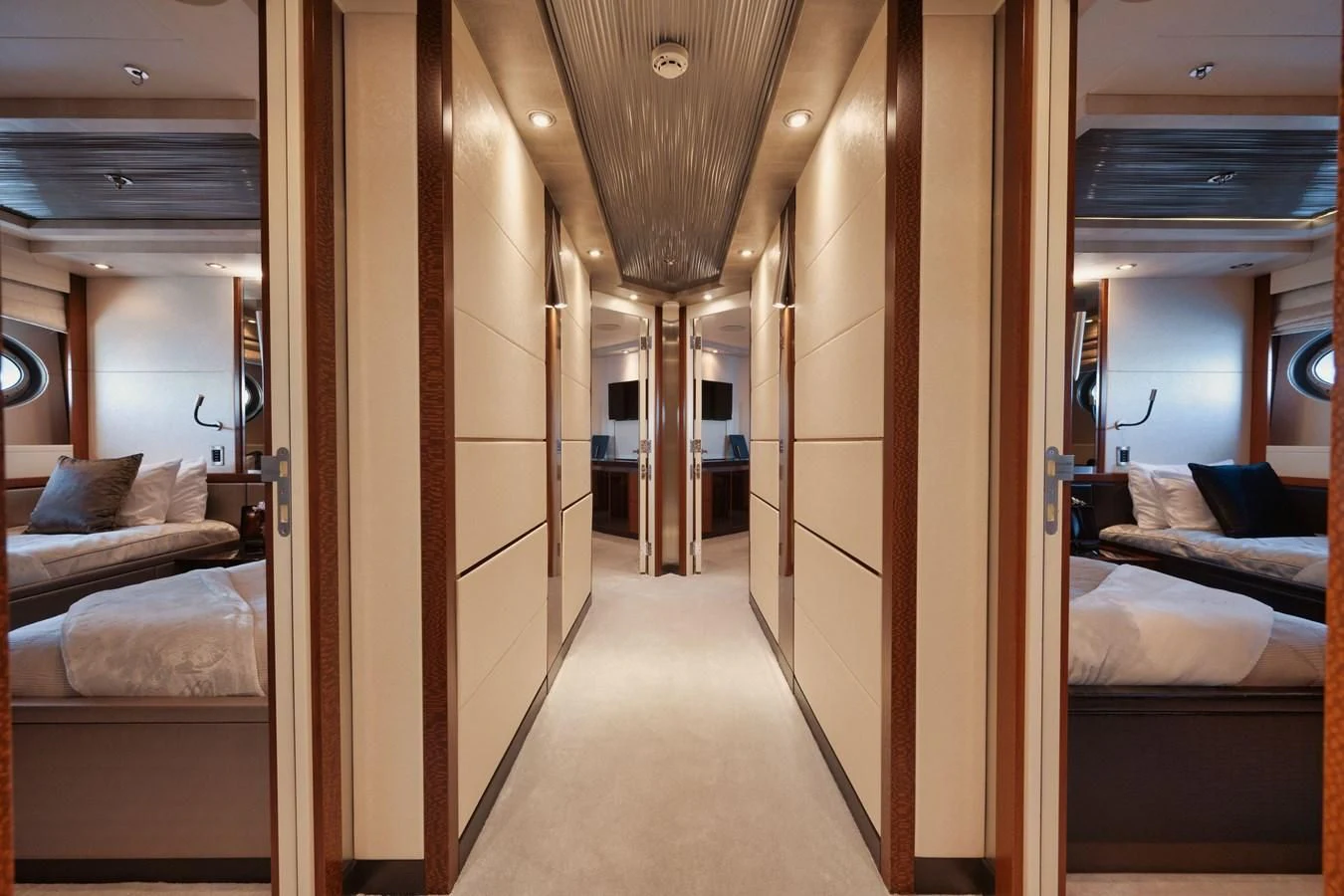 a room with a bed and a mirror aboard AQUANOVA Yacht for Sale