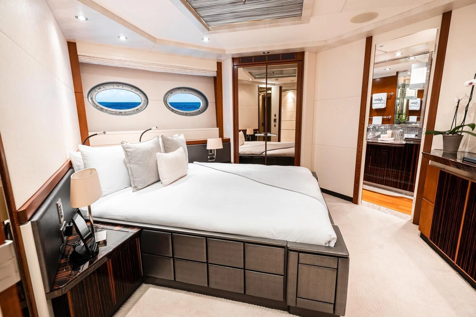 a bed in a room aboard AQUANOVA Yacht for Sale