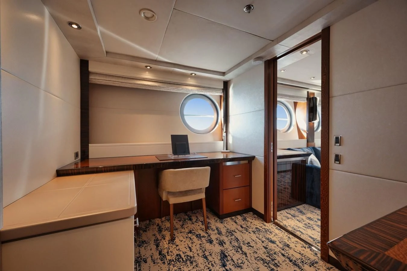 a room with a desk and a chair aboard AQUANOVA Yacht for Sale