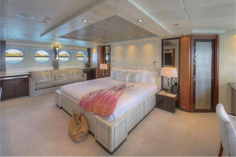a large bedroom with a bed aboard AQUANOVA Yacht for Sale