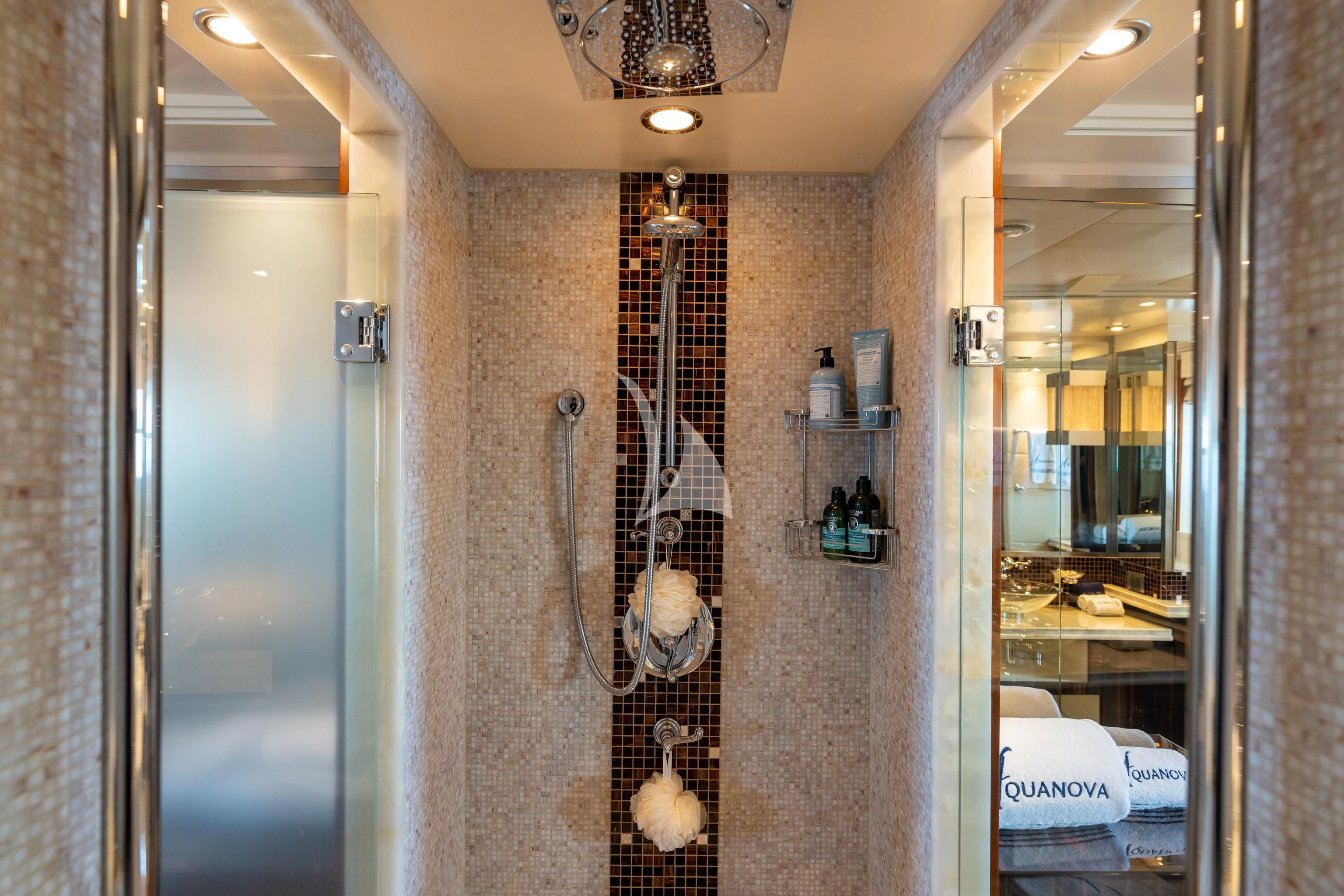 a shower with glass doors aboard AQUANOVA Yacht for Sale