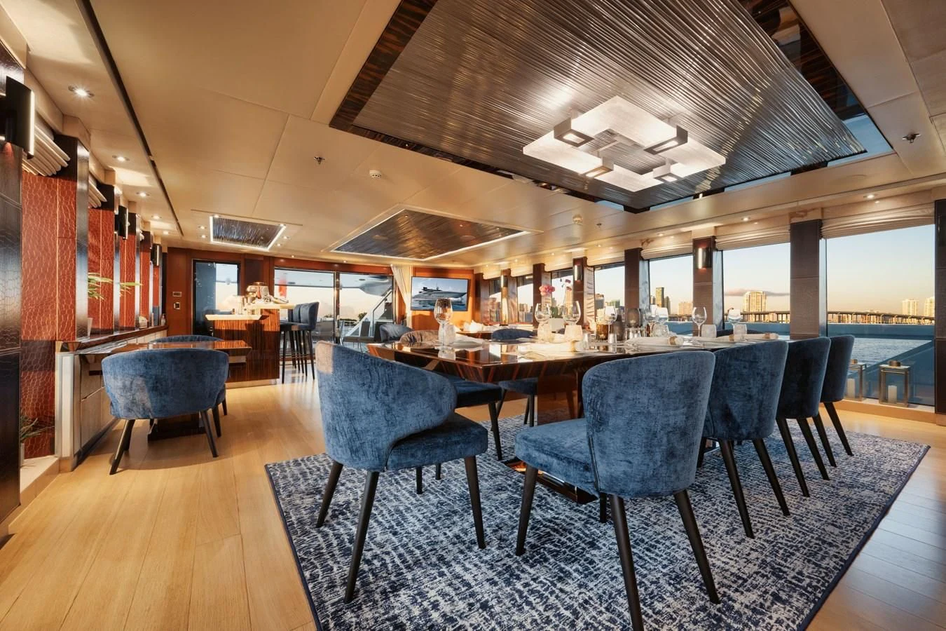 a large room with a table and chairs aboard AQUANOVA Yacht for Sale