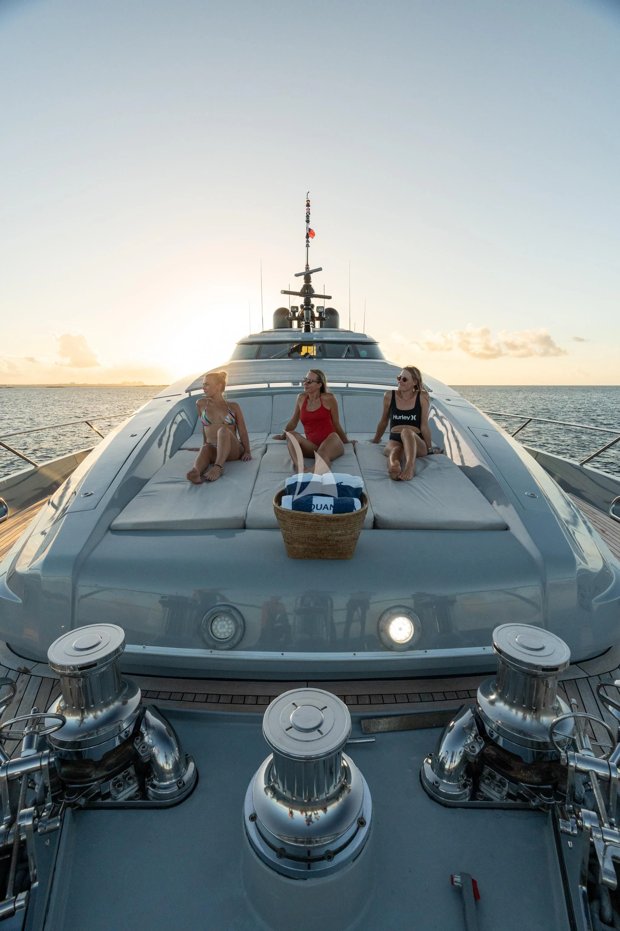 a group of women sitting on a boat aboard AQUANOVA Yacht for Sale