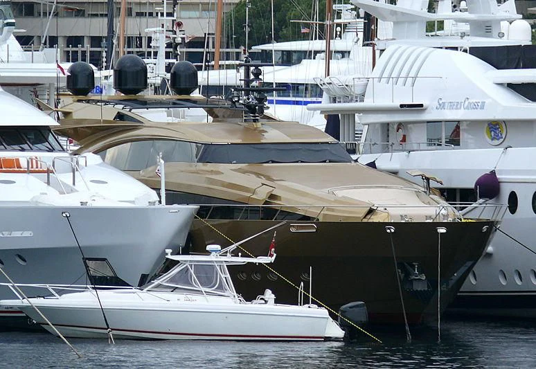 several boats are parked in a harbor aboard AQUANOVA Yacht for Sale