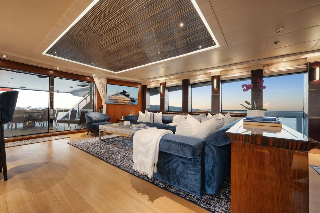 a room with a bed and a desk aboard AQUANOVA Yacht for Sale