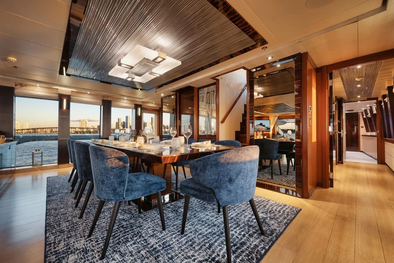 a large dining room with a large table and chairs aboard AQUANOVA Yacht for Sale