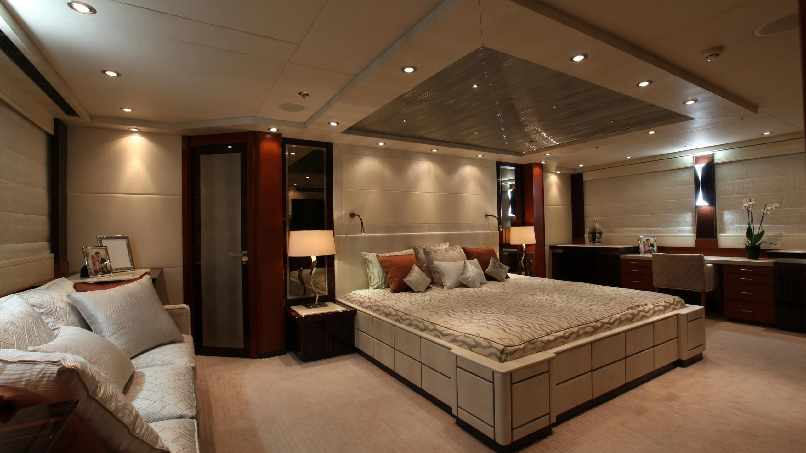 a large bedroom with a large bed aboard AQUANOVA Yacht for Sale