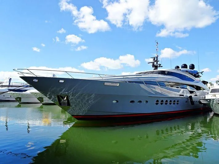 a boat docked at a pier aboard AQUANOVA Yacht for Sale
