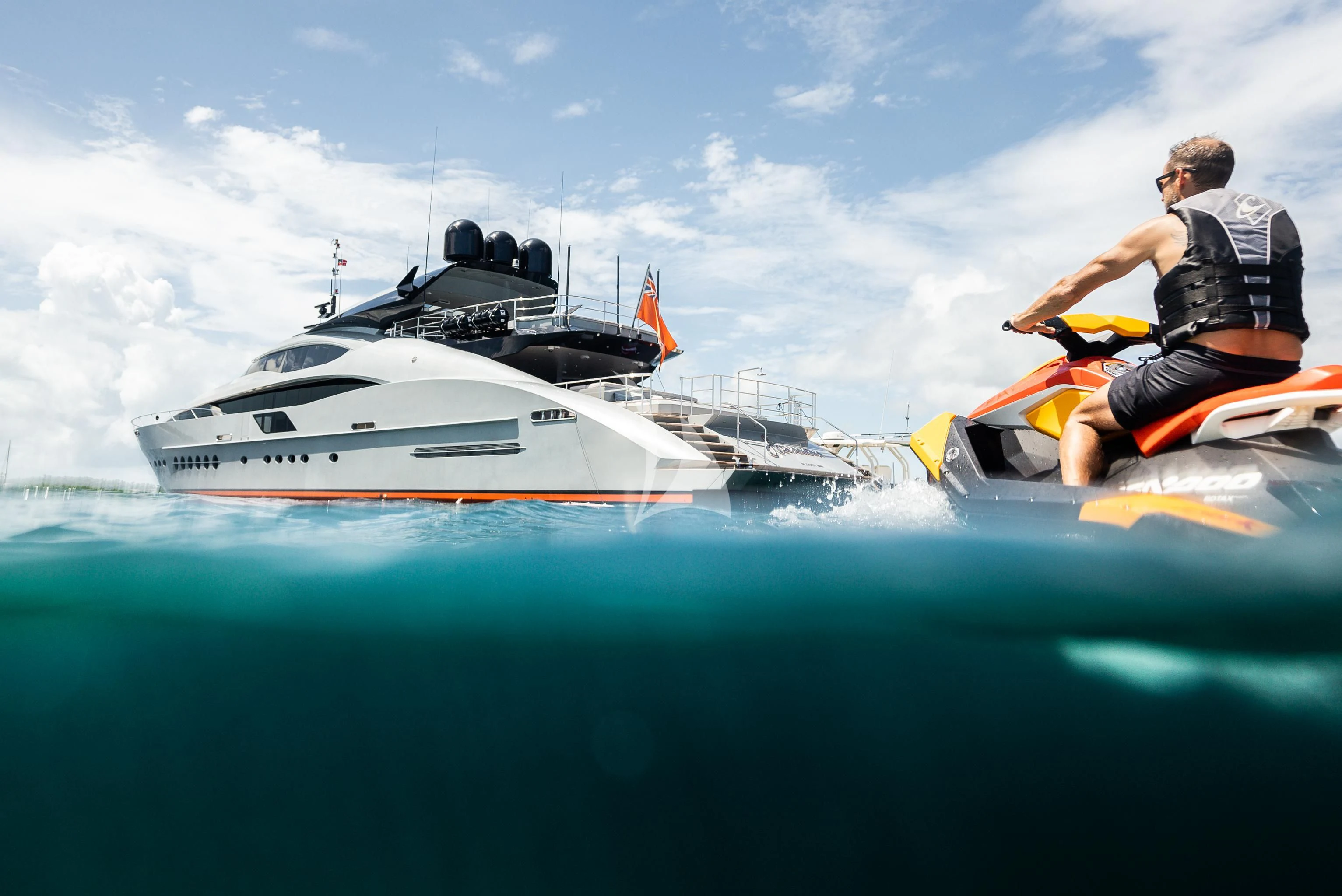 a man on a boat aboard AQUANOVA Yacht for Sale