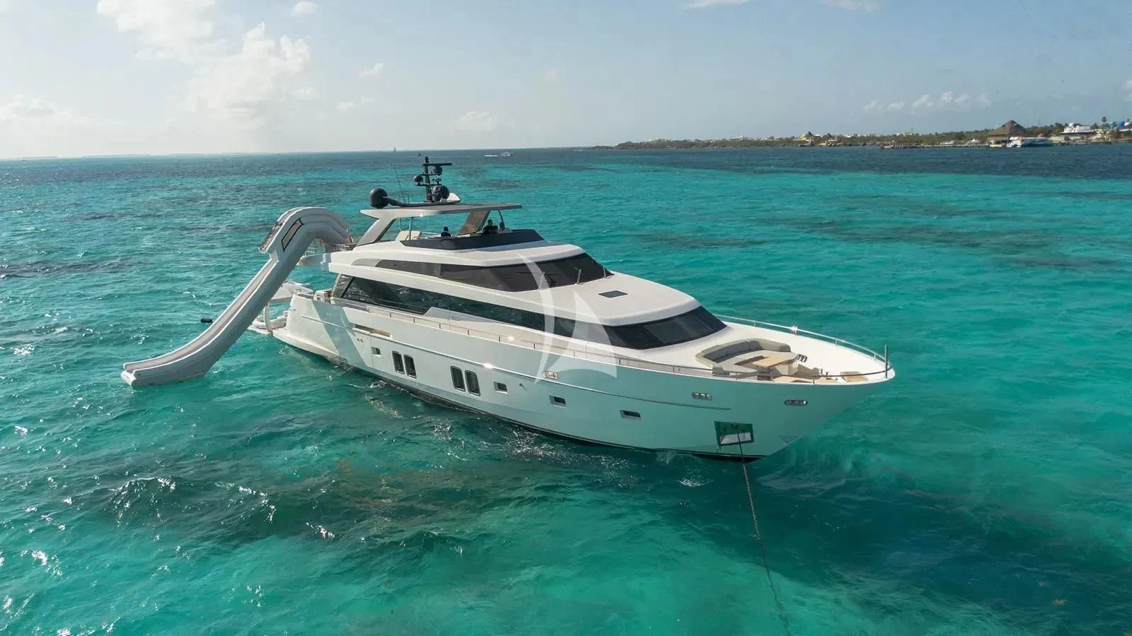 a white yacht in the water aboard MUMA Yacht for Sale