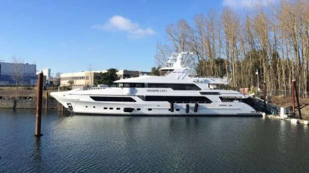 a large white yacht in a body of water aboard MISS MICHELLE Yacht for Sale