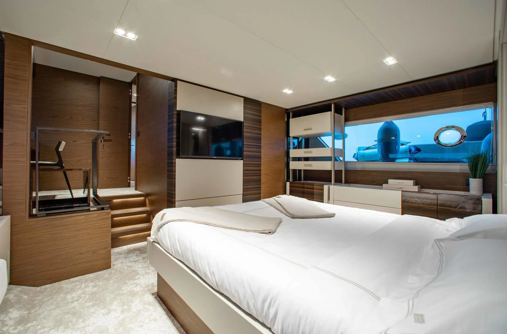 a room with a bed and a slide aboard OUR TRADE Yacht for Sale