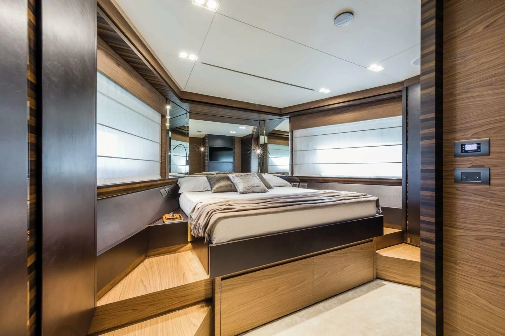 a room with a bed and a window aboard OUR TRADE Yacht for Sale
