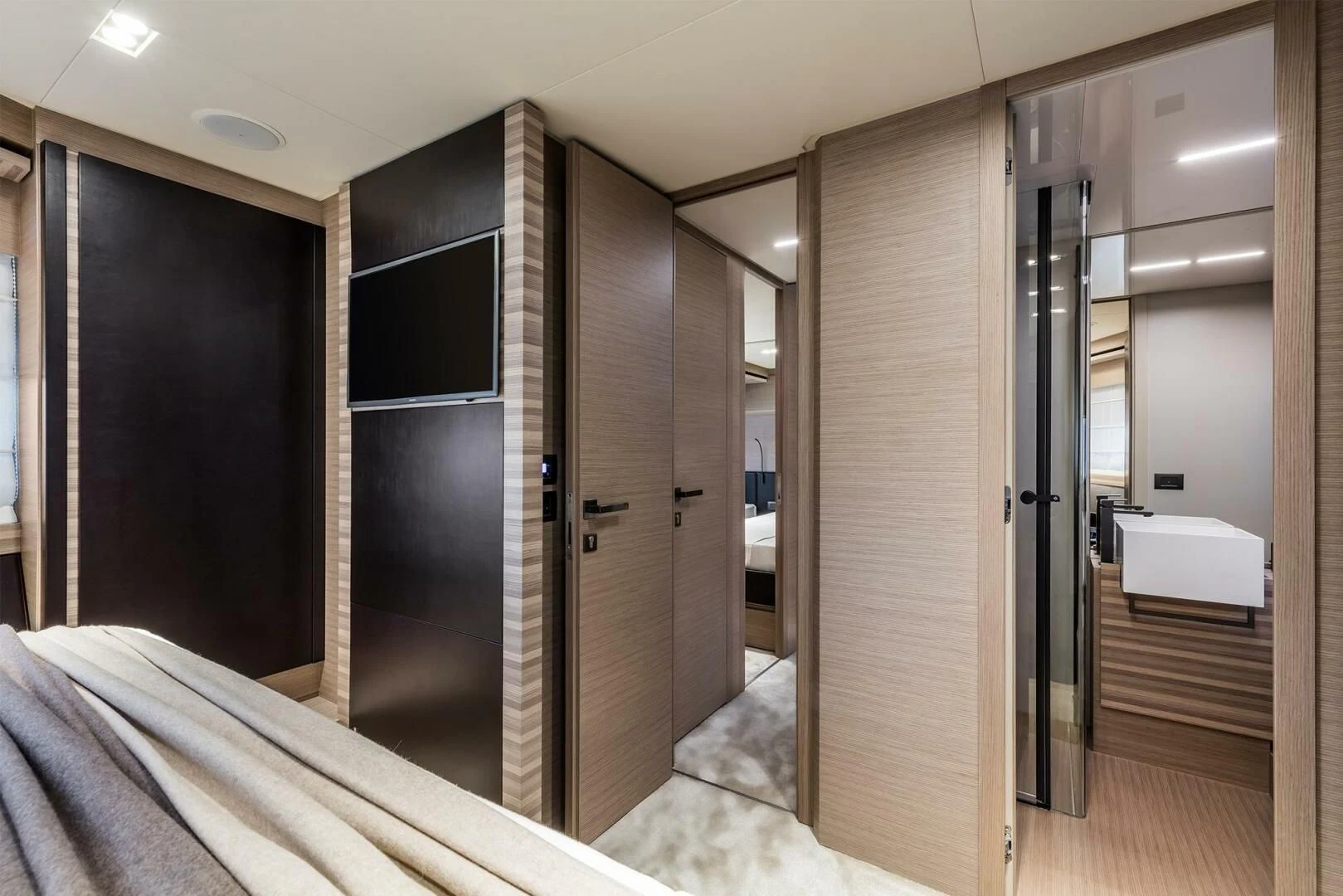 a room with a bed and a closet aboard OUR TRADE Yacht for Sale