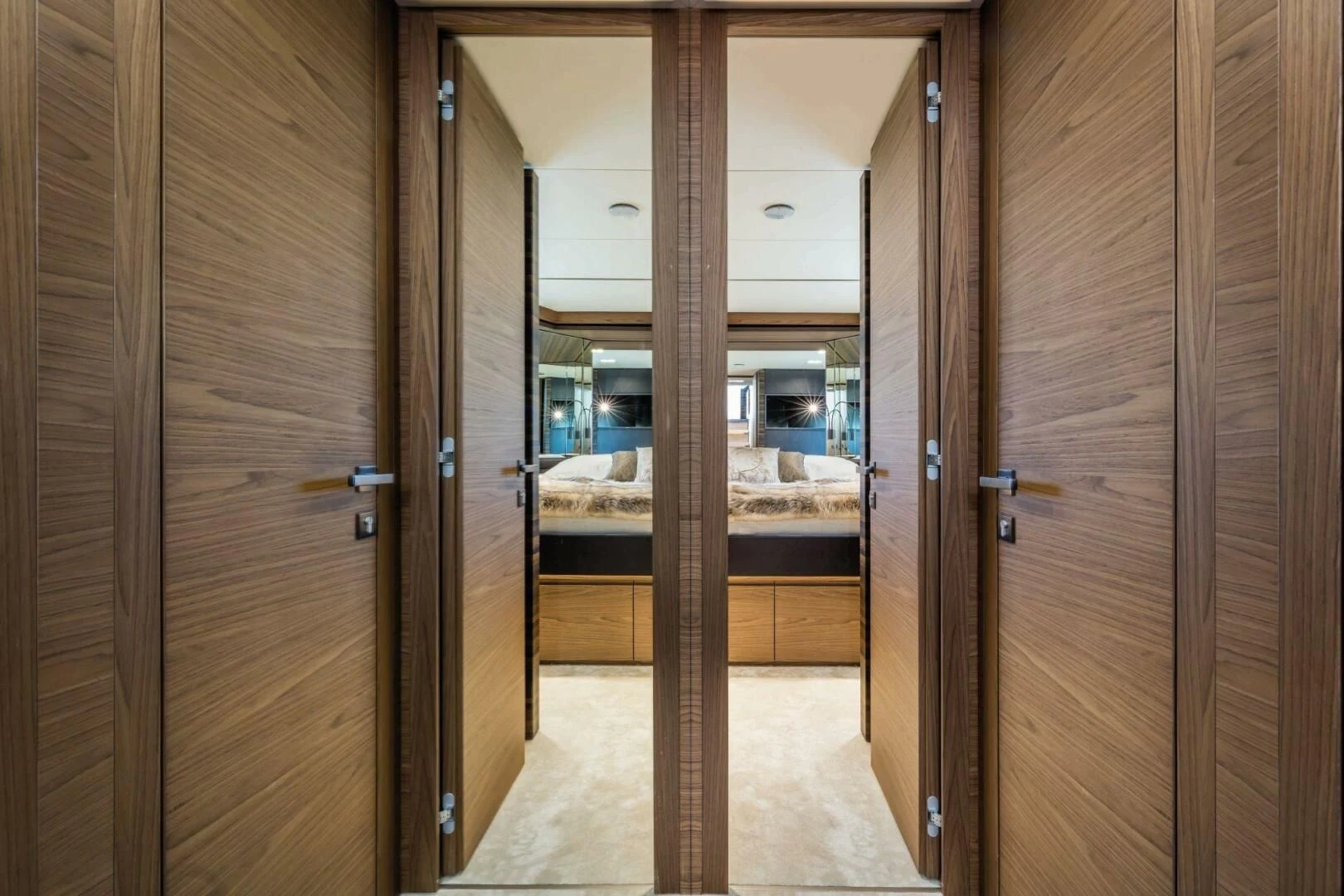 a room with a bed and a closet aboard OUR TRADE Yacht for Sale